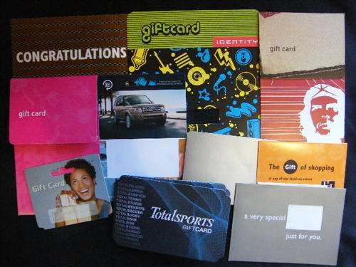 10 Unissued Gift cards or packets - you bid per item to take all - no values loaded - for collectors