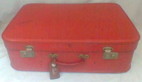 RED SUITCASE  LEFT INSIDE OF CASE HAS WATER MARKS