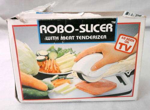 ROBO-SLICER WITH MEAT TENDERIZER HAS NOT BEEN USED BLADES ARE STILL VERY SHARP