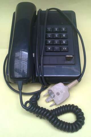 OLD LANDLINE PHONE WITH KEY