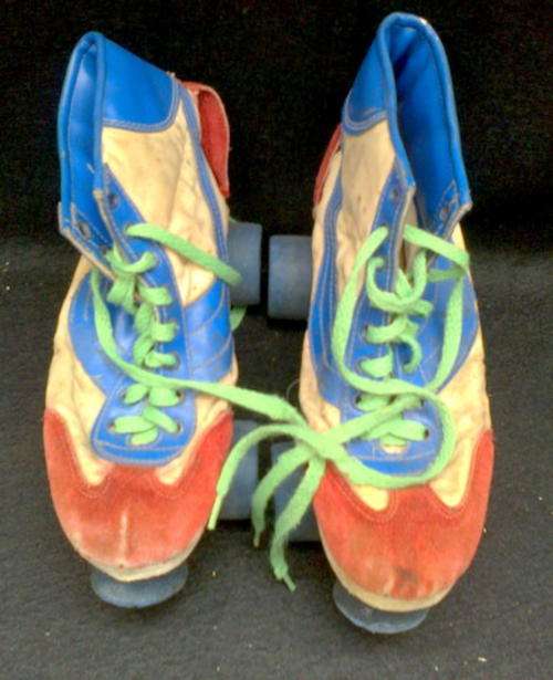 OLD STYLE ROLLERSKATES  VERY WELL USED AND WORN SKATES