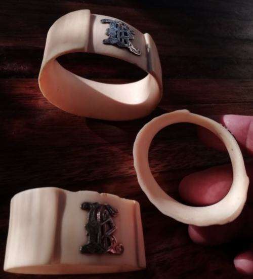 FROM THE VICTORIAN ERA | COLLECTIBLE SET OF 3 IVORY SERVIETTE RINGS EMBELLISHED WITH SILVER LETTERS