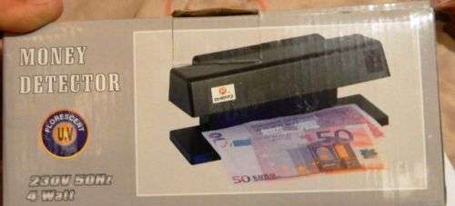 Counterfeit money detector