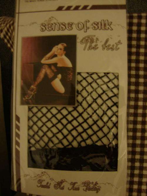 Fishnet stockings (Thigh High with lace details)