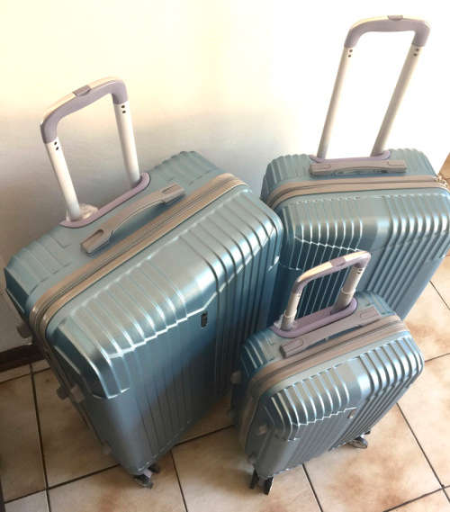 Set of 3 Suitcases Travel Trolley Luggage ABS Universal Wheels - Light Blue Color