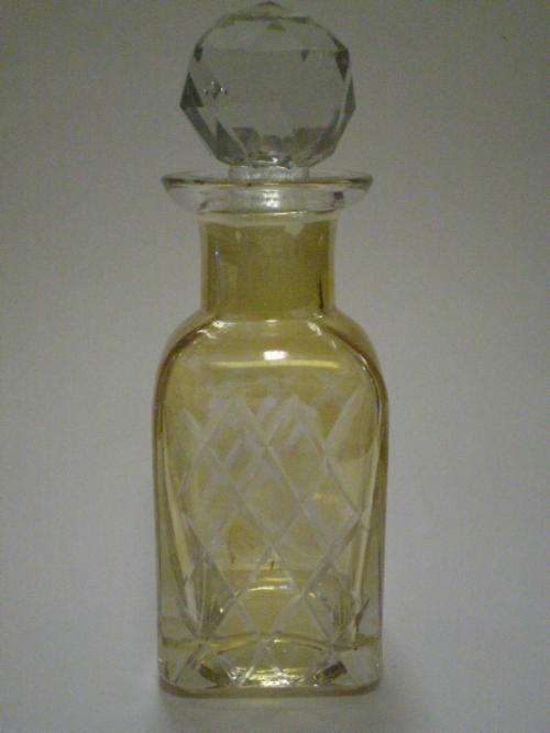 AMBER COLOURED GLASS PERFUME BOTTLE
