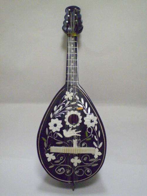 UNUSUAL MUSIC BOX, SHAPED AS A MANDOLIN