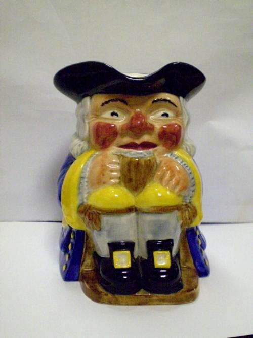 LARGE  TOBY JUG - BY CLARICE CLIFF ??SOME REPAIR ??