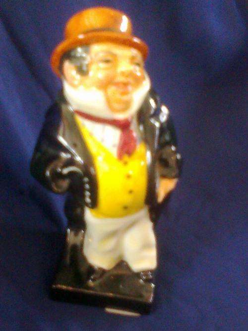 ROYAL DOULTON 'CAPTAIN CUTTLE' FIGURINE.