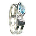Marquise cut flashy swiss blue topaz set on a sterling silver frame