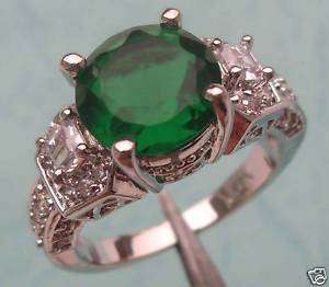 Lady's beautiful emerald 10kt white gold ring SIZE:8