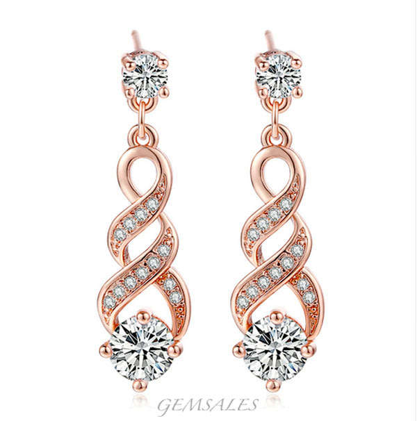 AUSTRIAN CRYSTAL SET IN 18KGP ROSE GOLD PLATED STUD EARRINGS