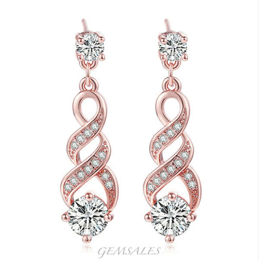 AUSTRIAN CRYSTAL SET IN 18KGP ROSE GOLD PLATED STUD EARRINGS