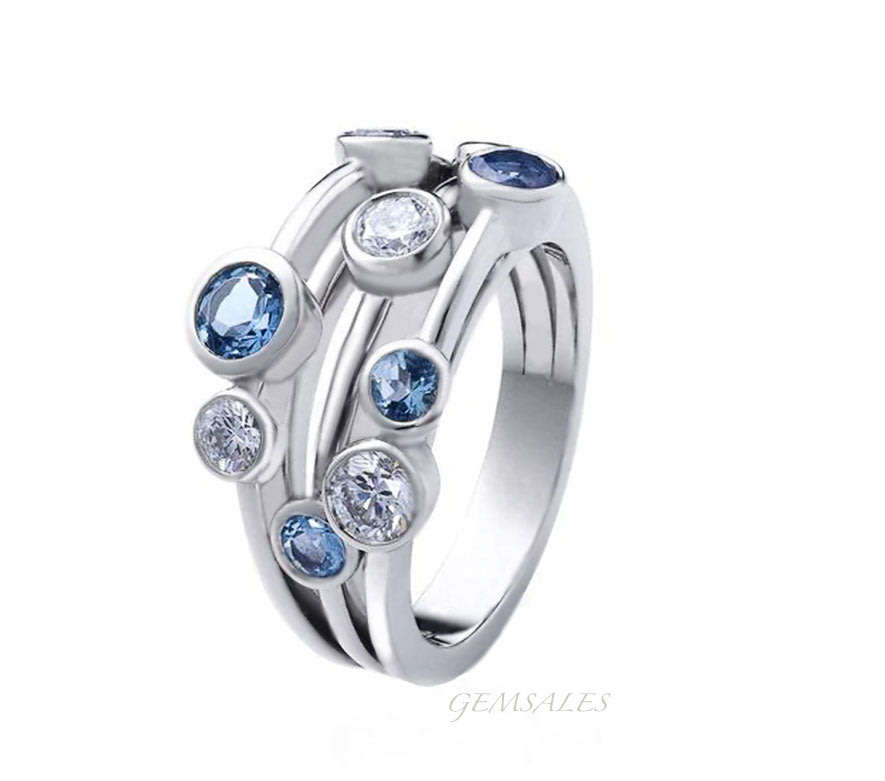 EXQUISITE BLUE & WHITE TOPAZ CZ IN TUBE SETTING*S925*  SIZES  6  -  8  -  9  -  10  AVAILABLE