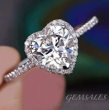 Elegant .75ct Sim Diamond CZ Heart in Halo Setting    SIZE   7.75
