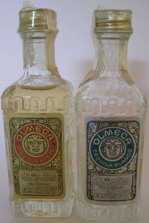 TWO TEQUILA MINIATURES (GLASS) SEALED, ONE EMPTY