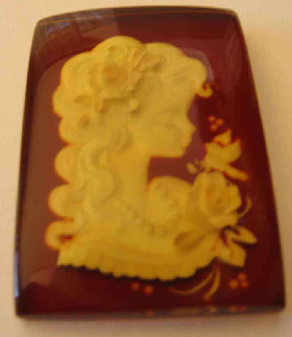29.00 x 20.00 MM Octagonal cut  '' CAMEO LADY '' CARVED IN AMBER 13.35 CT.