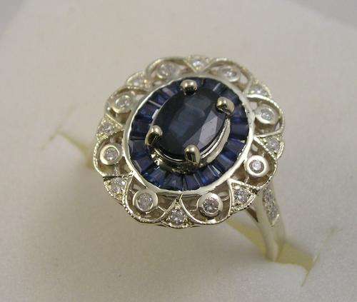Corona of Desire -14 K White Gold , Blue Sapphires and Diamonds Ring.