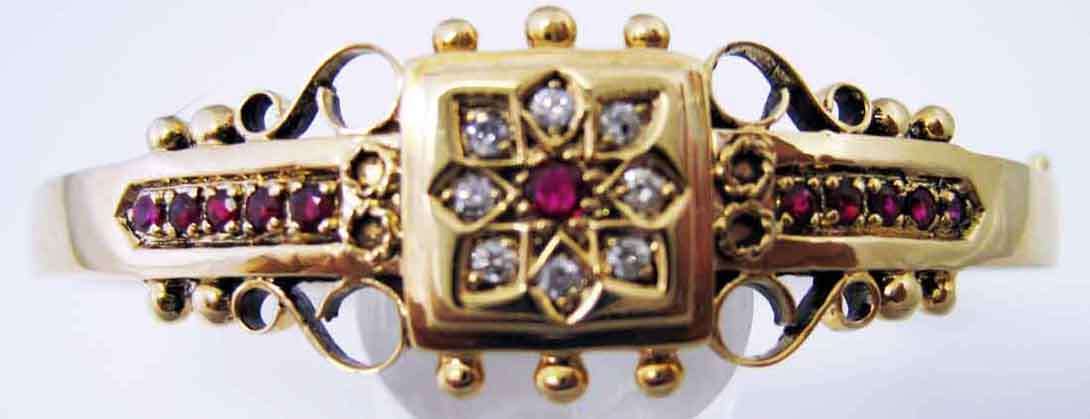 Exqusite Antiq- Style Solid Gold Bangle with Genuine Rubies and Diamonds.
