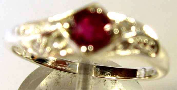 Genuine Ruby and Diamonds in solid Sterling Silver Ring.