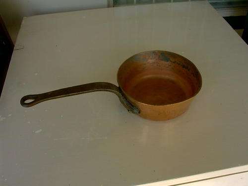 Very old solid copper pot