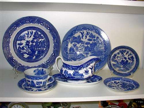 Collection of old willow pattern plates and other items
