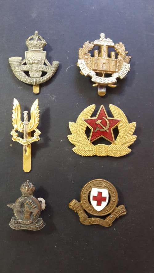 Collection of cap badges plus others