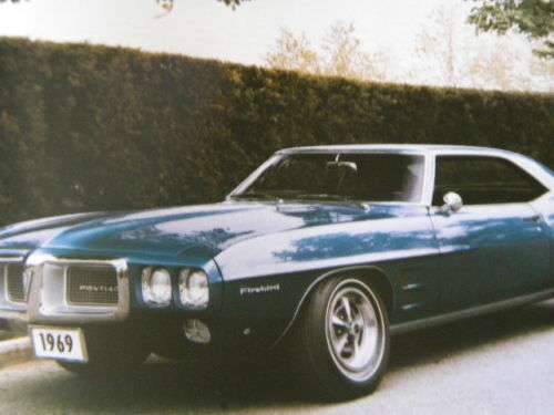 AUTOMOBILES OF THE SIXTIES  by Timothy Jacobs