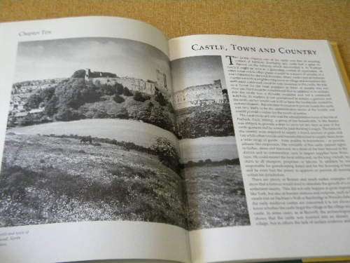 CASTLES and STONGHOLDS  by Richard Muir