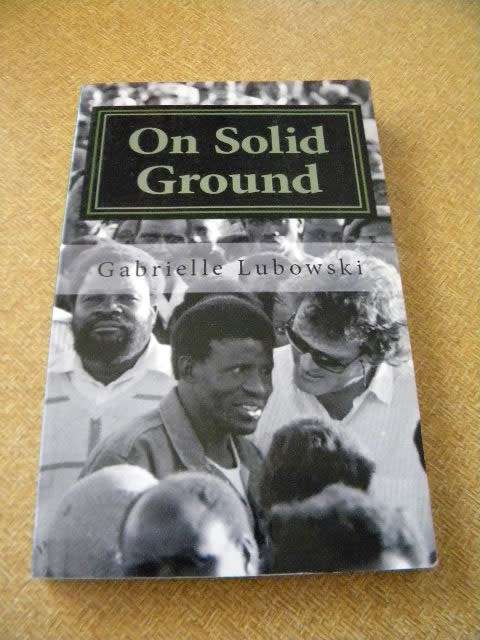 ON SOLID GROUND  by Gabrielle Lubowski  (SIGNED) The widow of Anton Lubowski'sstory.