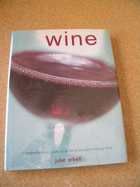 WINE  A comprehensive guide to drinking and appreciating wine  by Julie Arkell