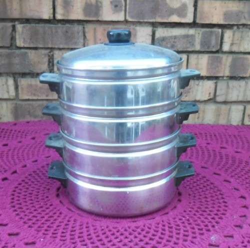 SET OF STEAM POTS (4)