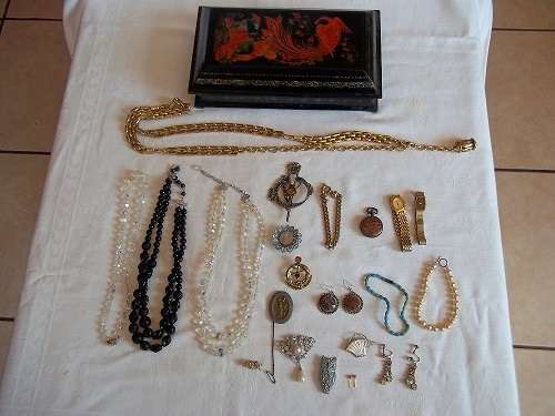 Lovely old lacquered jewellery box of vintage costume jewellery