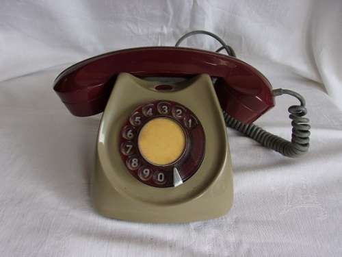 Vintage grey and maroon AEI RSA rotary dial telephone
