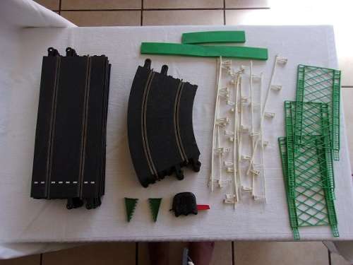 Lot of vintage Tri-ang Scalextric rubber standard tracks, a control and other items for 1 bid