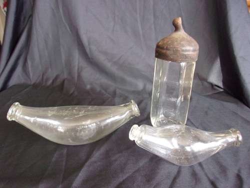 3 Antique glass infant feeding bottles for 1 bid