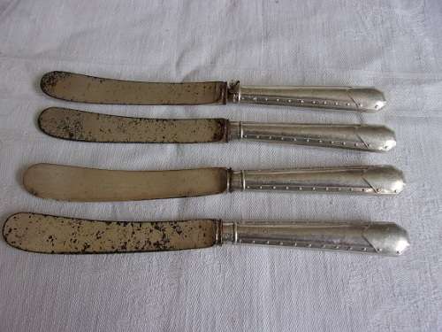 Set of 4 antique butter knives with Sterling silver handles