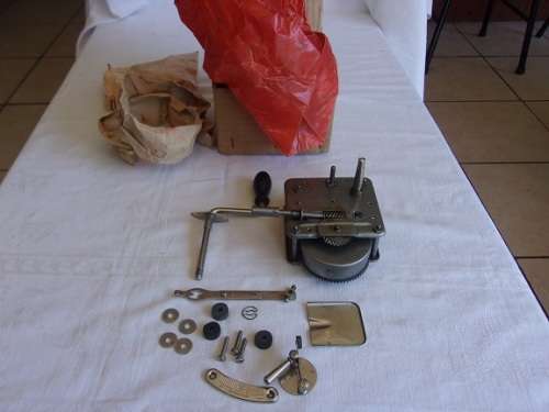 Vintage wind up gramophone motor, crank handle and speed regulator unit - still in original box