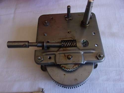 Vintage wind up gramophone motor, crank handle and speed regulator unit - still in original box