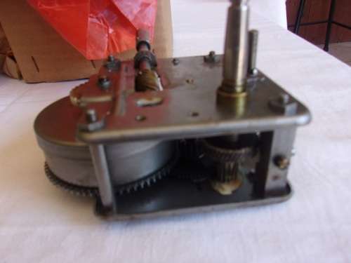 Vintage wind up gramophone motor, crank handle and speed regulator unit - still in original box