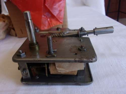 Vintage wind up gramophone motor, crank handle and speed regulator unit - still in original box