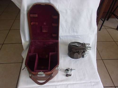 Vintage Bell & Howell "Filmo" 70 movie camera in leather case