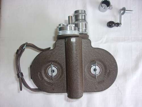 Vintage Bell & Howell "Filmo" 70 movie camera in leather case