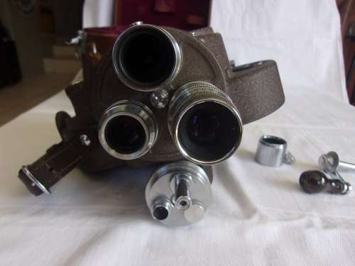 Vintage Bell & Howell "Filmo" 70 movie camera in leather case