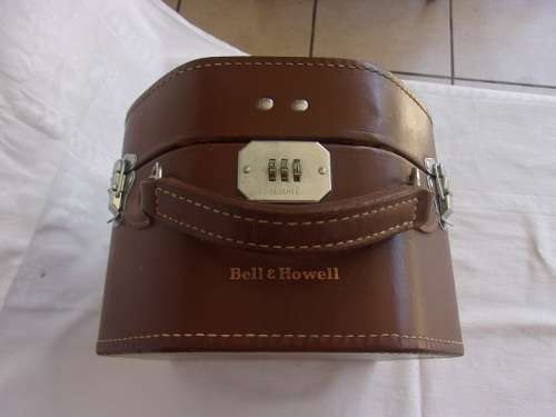 Vintage Bell & Howell "Filmo" 70 movie camera in leather case