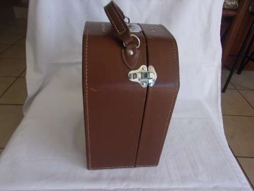 Vintage Bell & Howell "Filmo" 70 movie camera in leather case