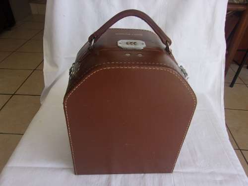 Vintage Bell & Howell "Filmo" 70 movie camera in leather case