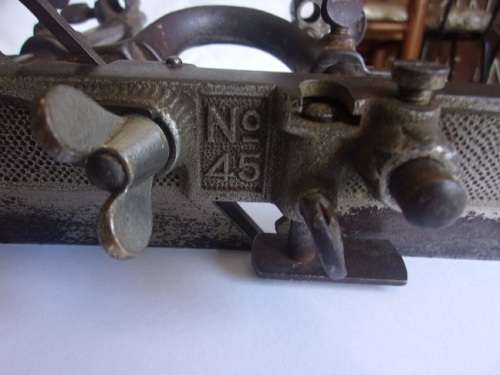 Antique Stanley Rule and Level Co. No. 45 combination plane with 21 cutters