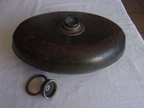 Antique oval metal and pewter hot water bottle/ foot warmer with brass lid