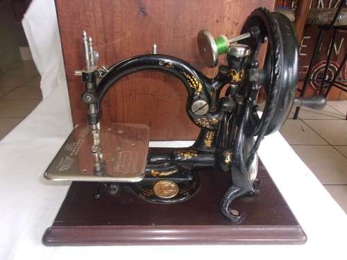 Rare Victorian Willcox & Gibbs sewing machine with wooden carry case